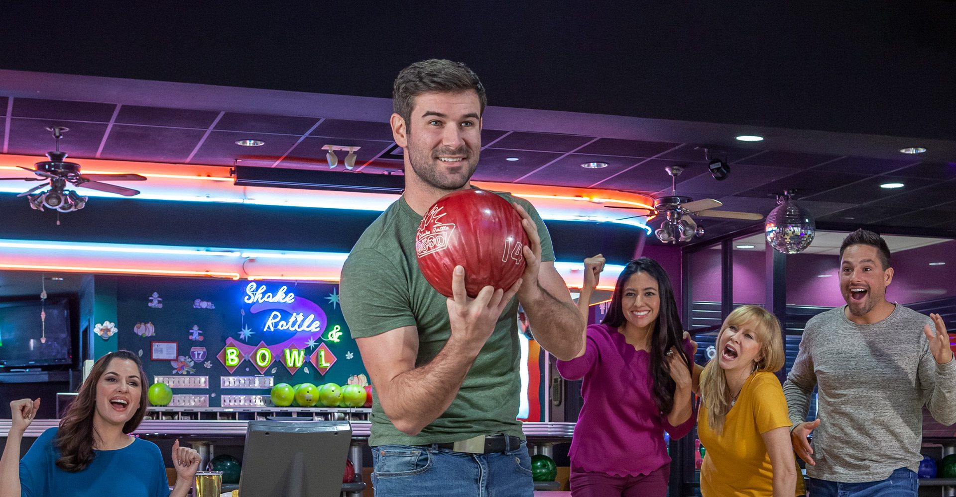 Group of friends bowling