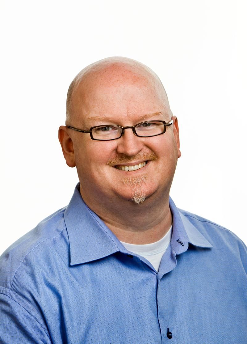 Image may contain Clothing Shirt Apparel Human Person Face Head Glasses Accessories Accessory and Man